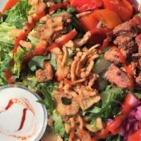 Beyond Cowboy · Romaine, arugula, Beyond Burger™, pickled red onions, spicy Mama Lil’s peppers, crispy onion...