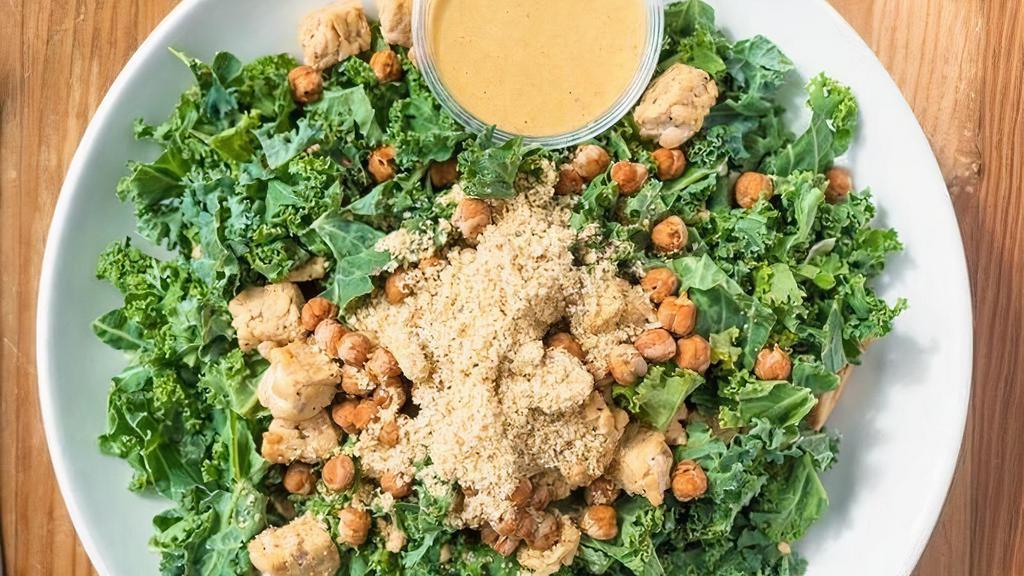 Hail To The Kale Family · Kale, tempeh, house-made parm*, crispy chickpeas, caesar dressing *parm made with almonds, nutritional yeast and garlic powder