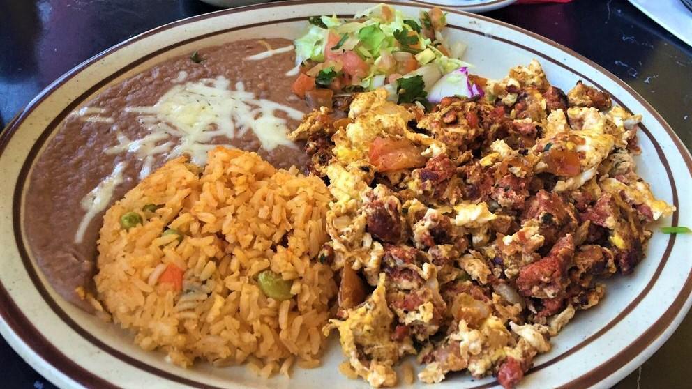 Huevos Con Chorizo · Scrambled eggs with mexican sausage and pico de gallo. Served with tortillas.

Consuming raw or undercooked meats, poultry, seafood, shellfish or eggs may increase your risk of food borne illness.