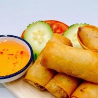Spring Roll · Vegetarian. Chopped vegetables rolled in wheat wrapper and deep fried until crispy. Served w...
