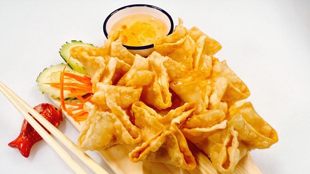 Wonton Cream Cheese · Corn and diced carrots mixed with cream cheese and wrapped in wonton wrappers. Deep-fried and served  with plum sauce.