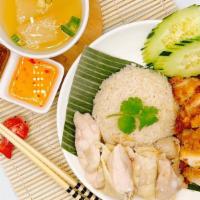 Combo Khao Man Gai + Gai Tod · Combination simmered chicken and 
Thai- fried chicken with ginger rice served with our signa...
