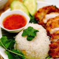 Khao Man Gai Tod (Thai-Fried Chicken) · Hand battered Thai style deep-fried chicken with ginger rice served with our homemade sweet ...