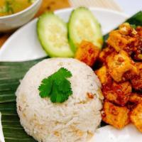 Khao Man Tofu · Our Homemade garlic sauce stir-fried crispy tofu with ginger rice, cucumber and tasty winter...