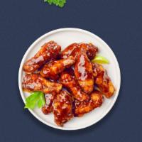 Bbq Biz Wings · Fresh chicken wings breaded, fried until golden brown, and tossed in barbecue sauce.