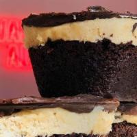 Bliss Brownie · Decadent brownie bottom, layered with cookie dough, and topped with rich chocolate ganache