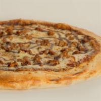 Bbq Chicken Pizza · Lots of BBQ sauce, chicken marinated in BBQ sauce and mozzarella cheese.