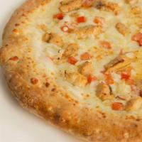 Barney Fife Pizza · White garlic sauce, chicken, fresh tomato, onion, and mozzarella cheese.