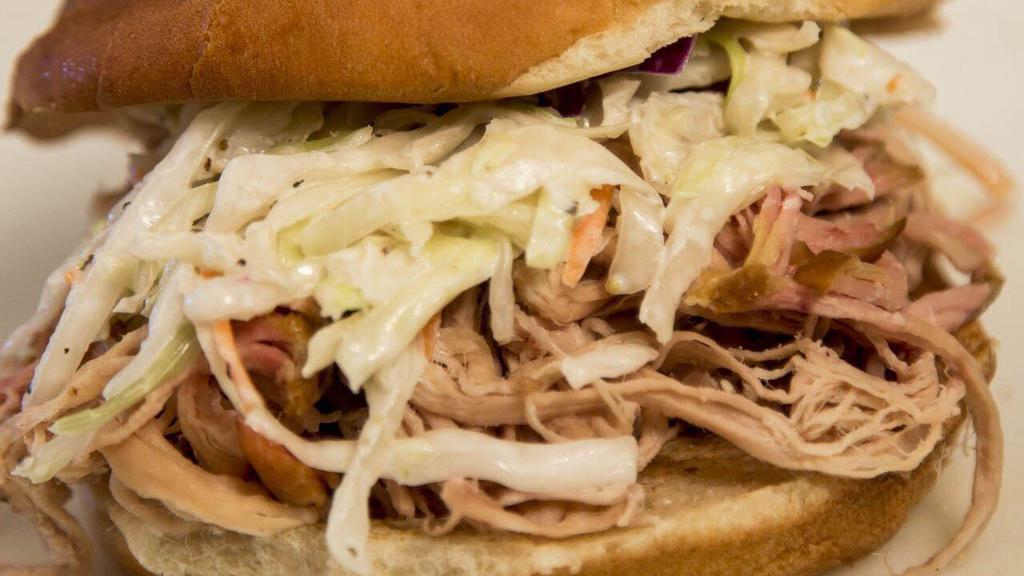 Porkhouse Sandwich · Pulled pork topped with coleslaw.