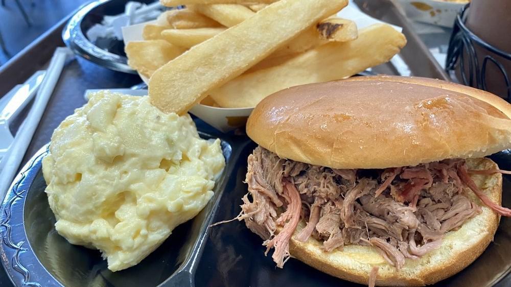 Smokehouse Sandwich · Brisket topped with hot link.