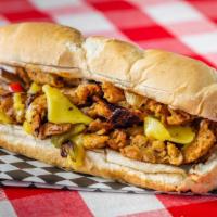 Philly Cheesesteak · Warm, creamy and delicious. Marinated soy curls, red and green pepper, and onions in a rich ...