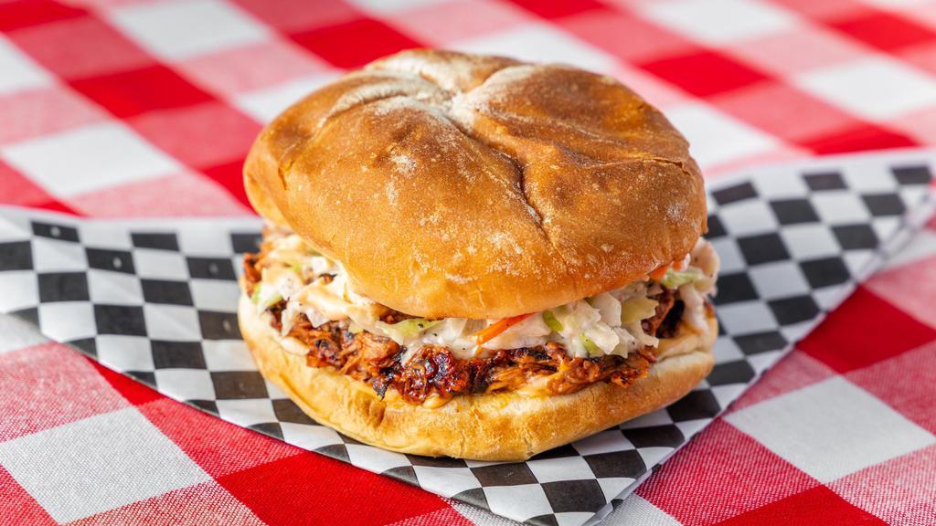 Bbq Jackfruit · This is perfectly prepared with jackfruit. Seasoned with tangy BBQ sauce. Served on a brioche bun, spicy mayo, pickles and coleslaw. A whole food vegan delight.