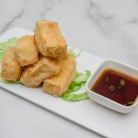 Agedashi Dofu · Deep fried tofu soaked in tempura sauce and top w/bonito flake