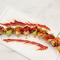 Dragon Roll · Tempura shrimp, cucumber and topped with bbq eel, avocado, spicy mayo, eel sauce, masago, an...
