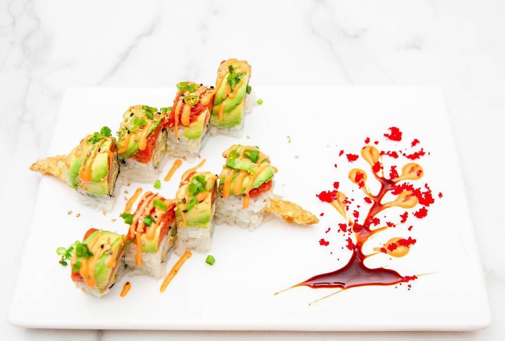 Spicy Tiger Roll · Tempura shrimp, cucumber and topped with spicy tuna, avocado, spicy mayo and green onion.