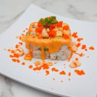 Volcano Roll · Imitation crab, avocado, cucumber and topped with baked scallops, masago, spicy mayo, and se...