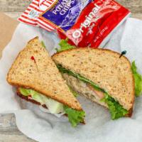 Tuna Salad Sandwich · Delicious albacore on Dave's killer bread with lettuce, tomato and onion with Tim's cascade ...