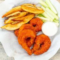 6 Pieces Buffalo Prawns & Chips · Spicy. Wild-caught prawns coated in hot and spicy buffalo sauce, served with ranch dip and c...