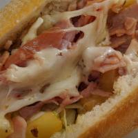 Salami And Provolone Sub · Salami and Provolone cheese topped with lettuce, tomato and onion, and seasoned with oil, vi...