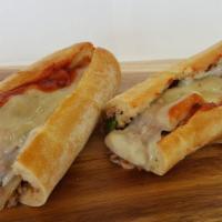 Pizza Steak Sub · Cheesesteak with marinara, provolone and mozzarella cheeses.  May be ordered without peppero...