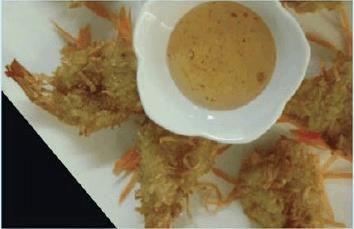 Coconut Prawns (Kung Ma-Praw) · Crunchy coconut battered prawns with plum sauce.