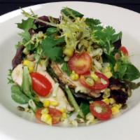 Cilantro Lime Salad · organic baby greens, jack cheese, heirloom tomatoes, grilled corn, pumpkin seeds, cilantro l...