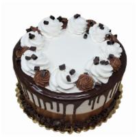Marble Truffle Cake · Double layer cake is shown in image. Cake is decorated as shown and made with white and choc...