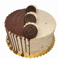 Cookies & Cream Cake · Double layer cake is shown in image. Cake is decorated as shown and made with chocolate cake...