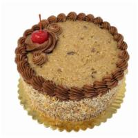 German Chocolate Cake · Double layer cake is shown in image. Cake is decorated as shown and made with chocolate cake...
