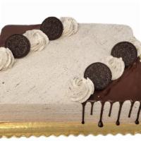 Cookies & Cream Sheet Cake · Cake is decorated as shown, made with chocolate cake and iced with a Whipped Cookies and Cre...
