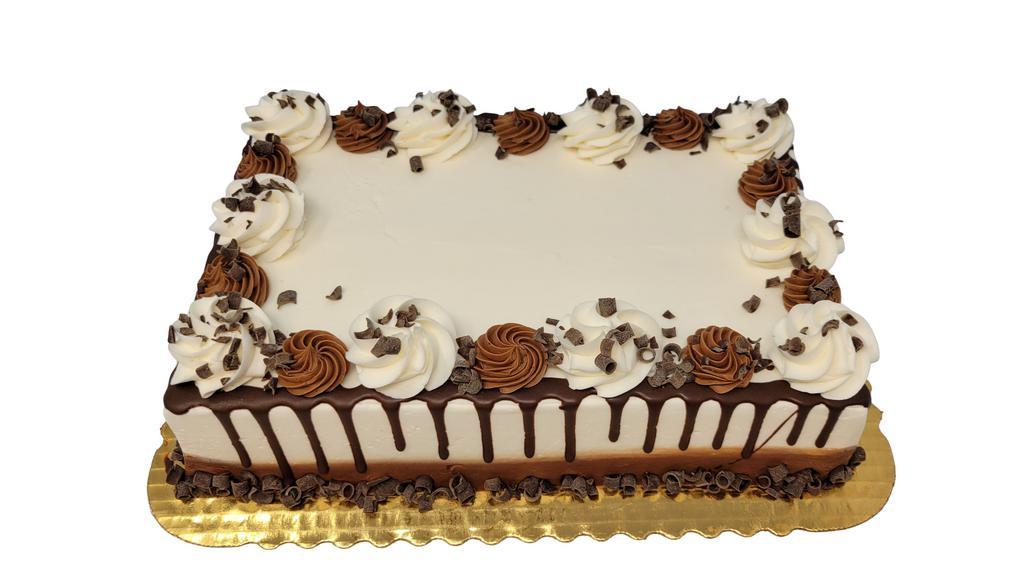 Marble Truffle Sheet Cake · Cake is decorated as shown, made with white and chocolate cake and iced with white and chocolate buttercream. Cake is then drizzled with chocolate truffle and finished with chocolate curls buttercream rosettes. If you would like writing on your cake, please specify message in Special Instructions box.
