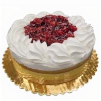 Cherry Boston · Cake is decorated as shown with white cake split and filled with Bavarian Cream. Topped with...