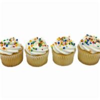 Cupcakes White · Cupcakes are topped with white icing and celebration sprinkles. Choose buttercream or whippe...