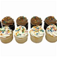 Cupcakes - White & Chocolate Variety · Assortment of white cupcakes topped with white icing and chocolate cupcakes topped with choc...