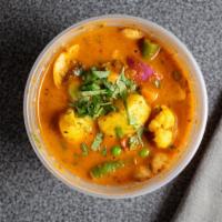 Vegetable Vindaloo · Chickpeas and mixed vegetables in a silky curry sauce. Served with rice, pachadi and pickle ...