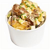 Roasted Gold Potato Salad · roasted organic gold potato, cream, chive, pickle and bacon.