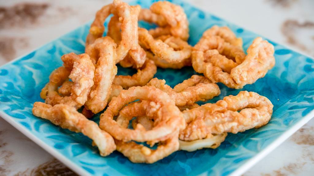 Fried Calamari · made with tender calamari and coated with lightly seasoned breading.