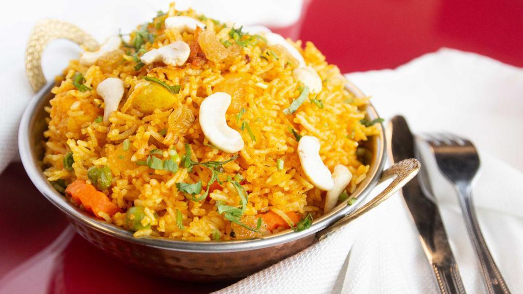 Vegetable Biryani · Classic muglai dish of curried vegetables in rice.