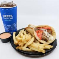 Pork Souvlaki In Pita Combo · Our pork souvlaki taken off stick and wrapped in pita bread. Topped with tomatoes and choice...