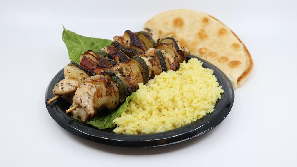 Double Chicken Souvlaki Entree · Entrees include rice or fries &  pita bread.
