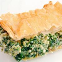 Spinach Pie (Spanakopita) · An authentic rich pie with spinach, feta cheese, and herbs. Crusted with phyllo dough and ba...