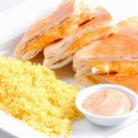 Kids Grilled Cheese · Includes rice or fries. All kid's menu items include a kid's drink.