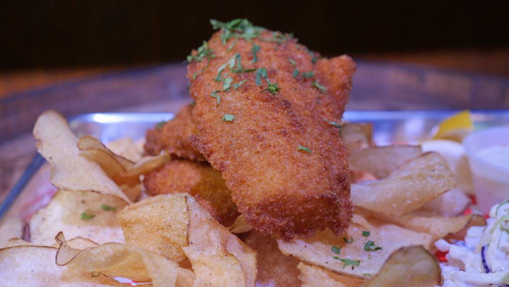 Fish & Chips · Crispy panko breaded Alaskan cod, cowboy tartar, creamy coleslaw, lemon slices, choice of chips or fries