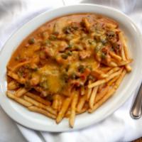 Chile Cheese Fries · Hot crispy fries, topped with New Mexican green chile and cheese