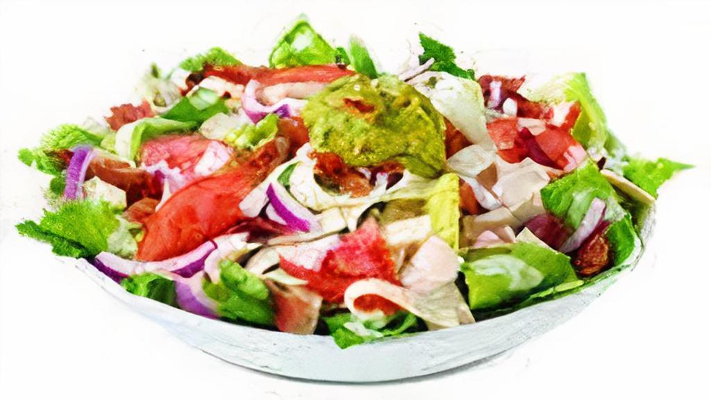 Veggie Guacamole Salad · Guacamole, cheddar, provolone, black olives, cucumbers, mushrooms, green peppers, tomatoes, and onions on a bed of crisp romaine lettuce. Served with a side of red wine vinaigrette.