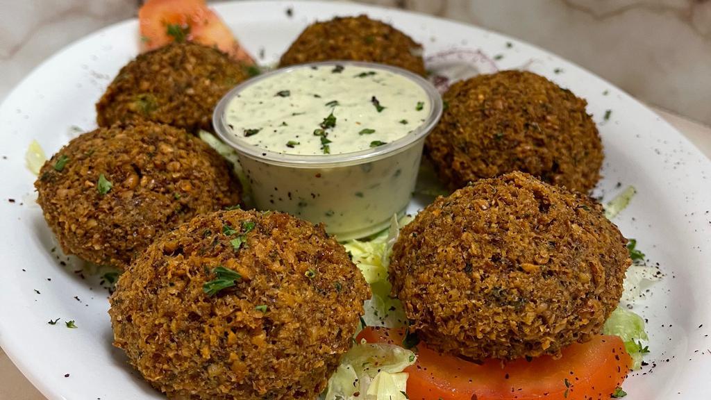 Falafel Appetizer · Deep fried chickpeas onion & parsley mixed with spices