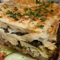 Spanakopita · Spinach & cheese baked between layers of flaky filo