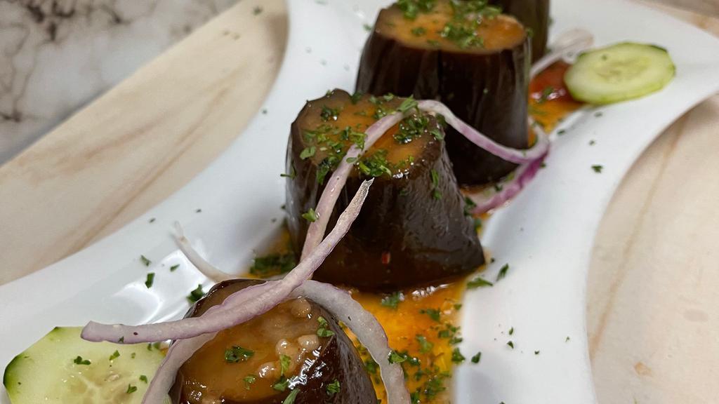 Stuffed Eggplant · Eggplant stuffed with rice onion & a special blend of spices