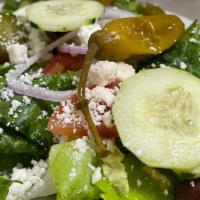 Greek Salad (Large) · Blend of romaine lettuce tomato onion cucumber & kalamata olives with feta cheese & our hous...