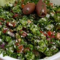 Tabbouleh · Finely chopped parsley bulgur tomato onion & spices mixed in lemon juice & olive oil